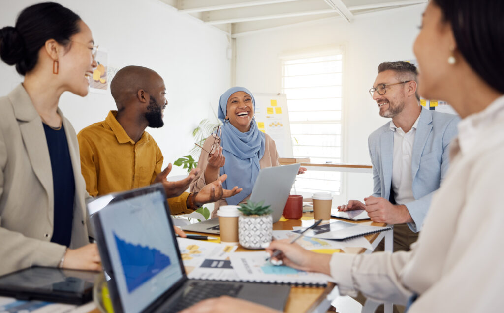 Strategy, planning and funny with business people in meeting for brainstorming, project management and partnership. Teamwork, collaboration and solution with employees in office for client proposal.